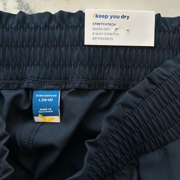 - NWT. Old Navy girls large (10-12) HR, keep you dry, running shorts. - Picture 3 of 4